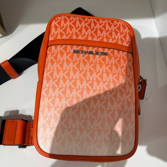 COPY - Michael Kors Cooper Medium KORS Logo Sling Pack NWT red clay logo - Picture 1 of 5
